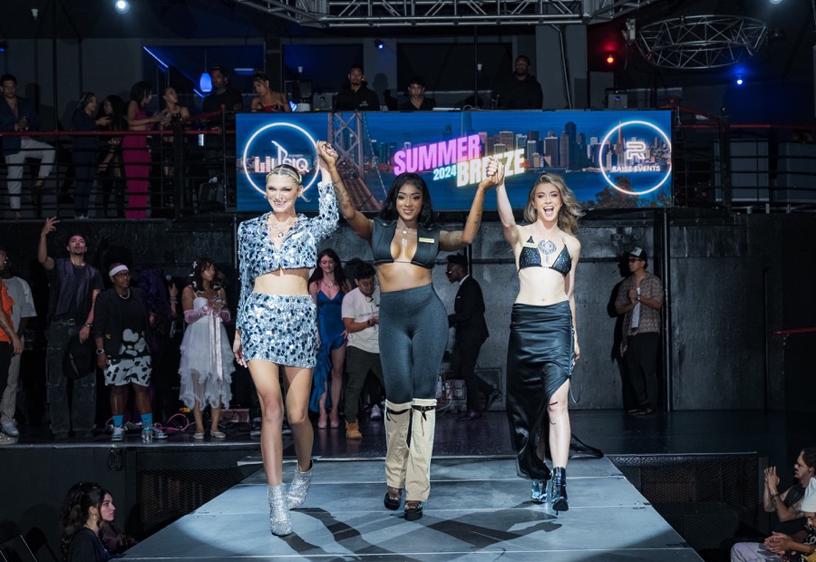 Models walking a runway at a fashion event