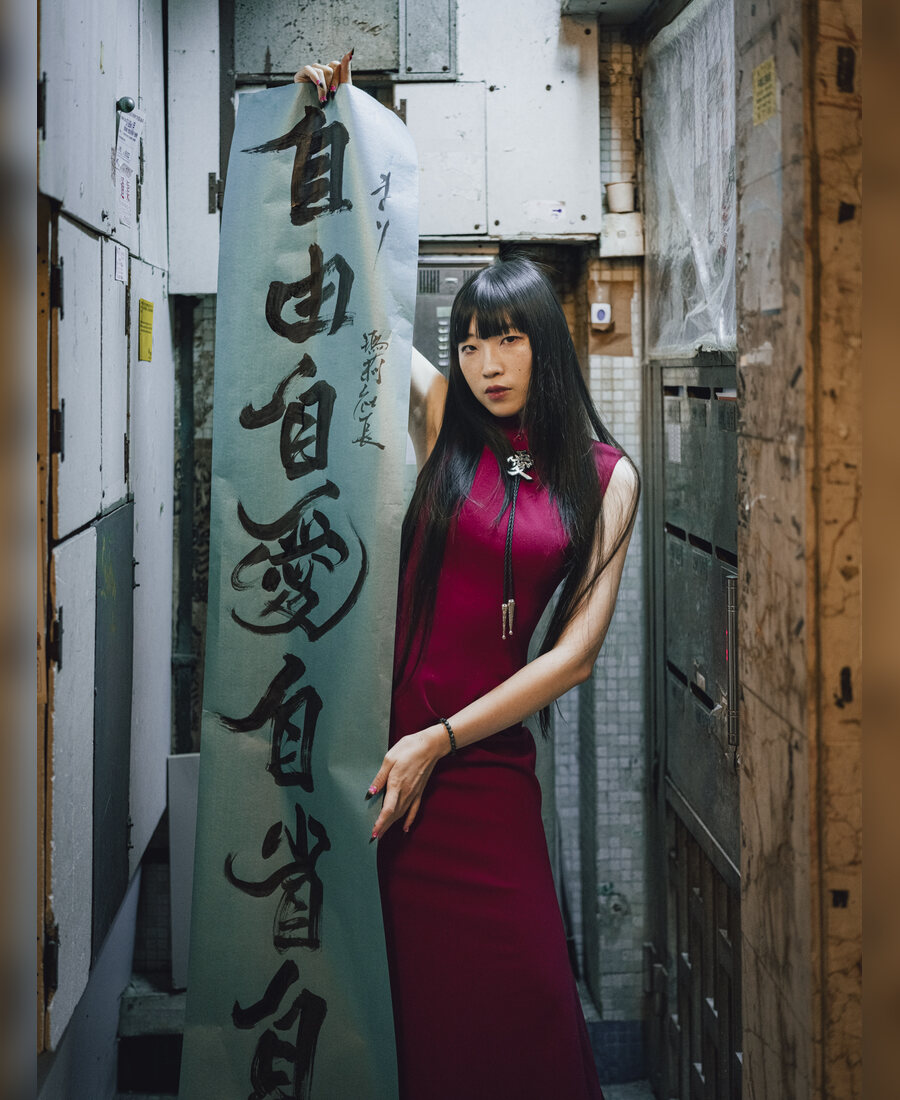 Fashion portrait of a woman in a pink dress
